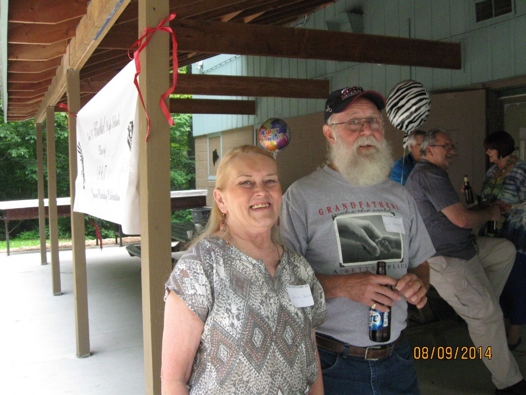 Chris Lewis Nowak and husband
