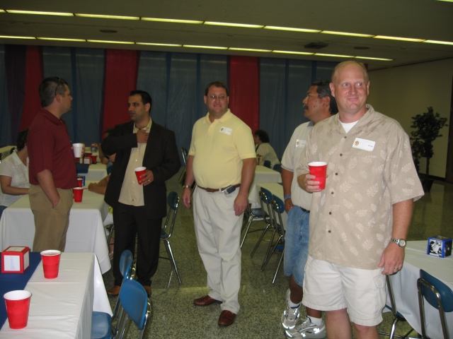Sumeet Sethi, Jeff Harrison, Duane Nakanishi & Mike Elkin spend some time getting reacquainted before dinner is served.