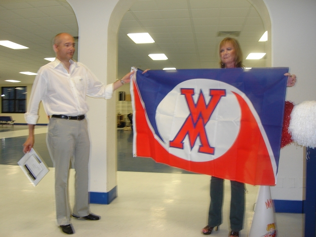 Robert Guillot is presented the new WHMS official flag in recognition of traveling the fartherest.  He came in all the way from California to attend! 