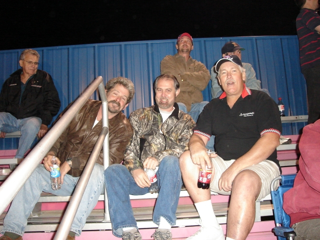 Peter Bacle, Gordon Pemberton and Marvin Head enjoy the game.