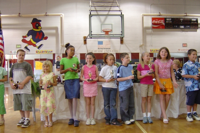 This is a picture of my (Kenneth Massey) stepdaughter, Sienna, at her 3rd grade award assembly in Nashville, NC in 2005.   She is near the middle in the pink outfit.