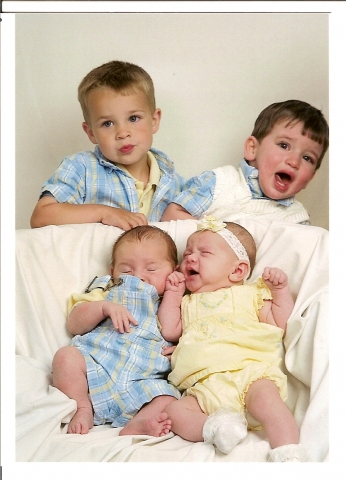 Posed pictures are nice but this is more like real life! Karen Claytons great-grandkids.