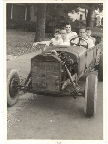 Clockwise: Larry Press (class of 57) is behind the wheel with John Carroll (57) and his brother Christopher (71) in the front seat. George Rogers (56) and Jim Press (64) are in back. John and Christophers mother took the picture.