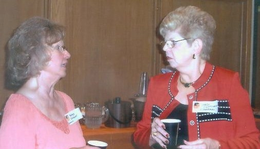 Sandra Sherman Clipsham chatting with Bettye Kahmann Caldwell at Overland Park Grade School Reunion