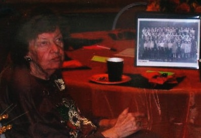 Mrs. Stiles Zimmerman with photo album given her at Overland Park Grade School Reunion