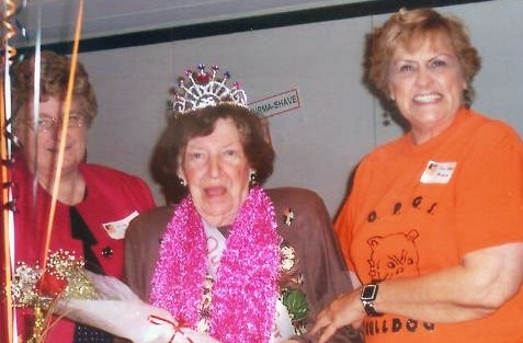 4th grade teacher crowned and presented lei and roses.  We also gave her a photo album with all 9 grades.

Jean Wehrman Nonemaker,  Mrs. Stiles Zimmerman,  Shirley Larson Williams 

