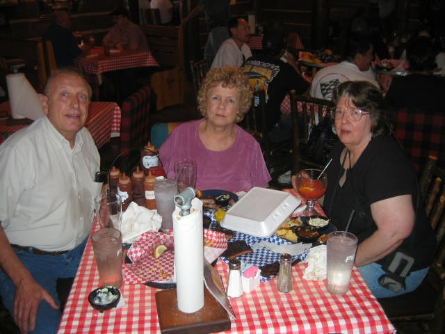 John Sherard, Sandy Grubb Chapman, Peggy Willis Sherard enjoying bbq at Famous Daves 