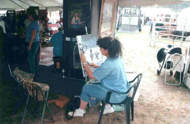 Yvonne Holste: Im hard at work selling paintings at an equestrian trade fair in Massachusetts