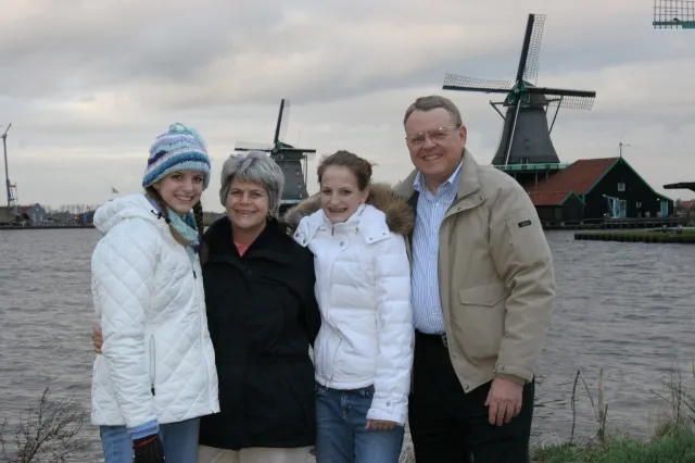 On the dyke in Holland,
Mike and Patty (Wenzell) Alexander with daughters, Faith and Laura    12-06