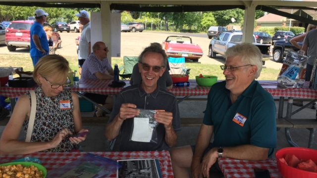 Peggy Mrkva, Kip Mrkva and Mitch Tracy. Steve Meyer and Pat & Patty Fritch in the background.