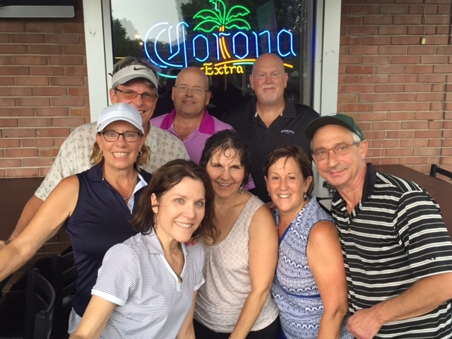 Wet but happy golfers