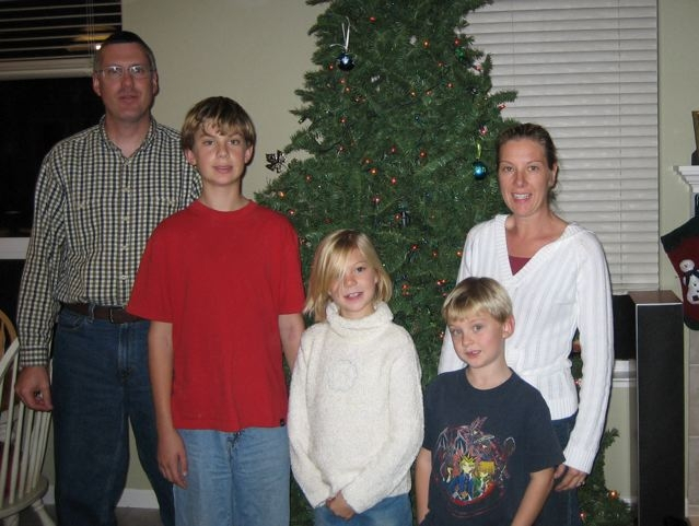 Laura (Boberick) Case, with Dan, Ryan, Becca and Russell. Christmas,
2005.