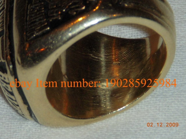 Another pic of the 10K markings. Notice how the 10K is crooked.  A real jostens ring it would not be crooked. And of course it would have the jostens logo or the JOSTENS spelled out.   Notice the place where the 10K is stamped if the ring was resized whic
