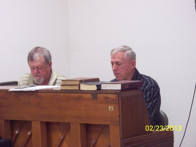Hershel(left)gets ready to start the service with a congregational song at Taylors Chapel.