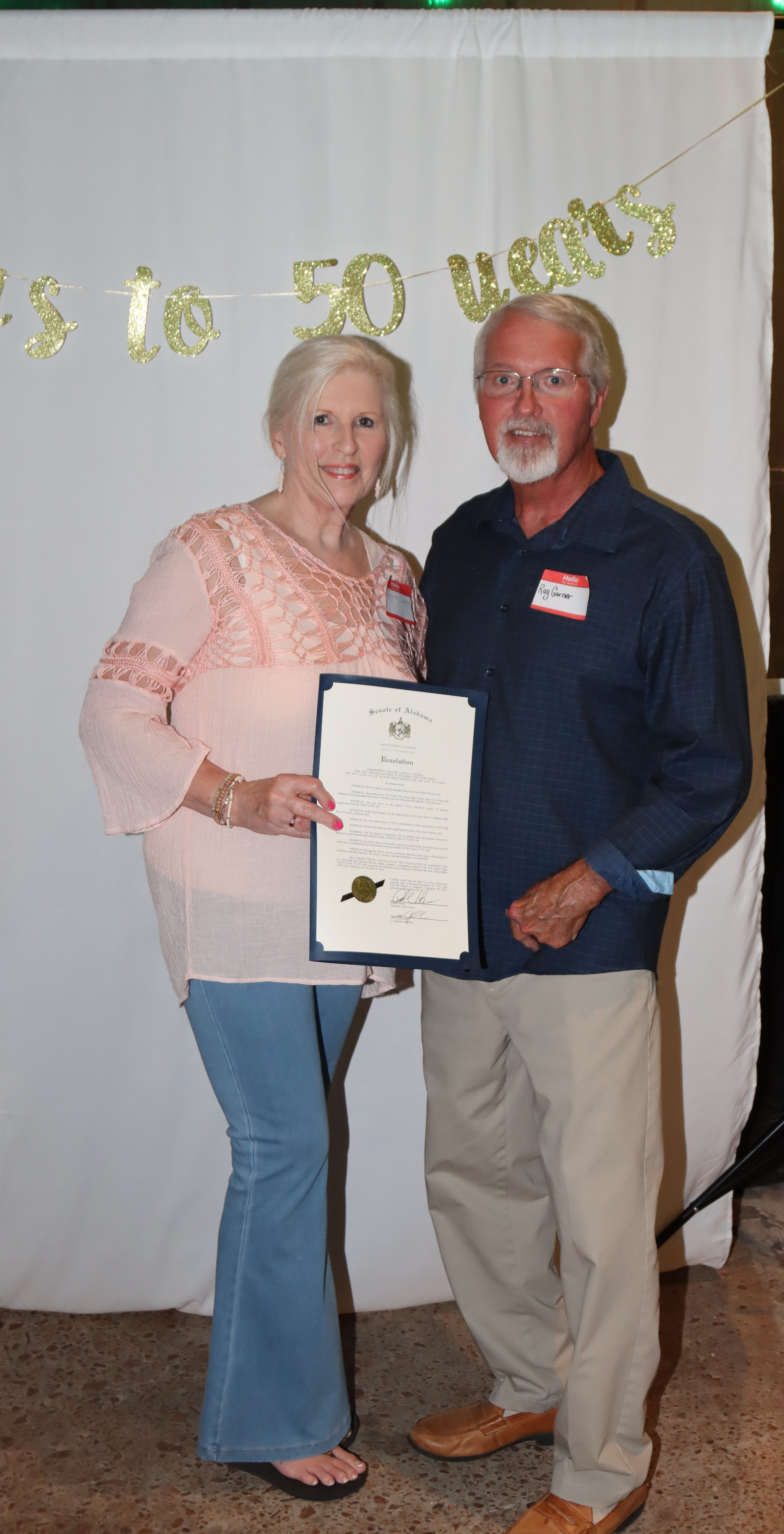 Ray Garner presenting Beverly Cantrell with Alabama Resolution