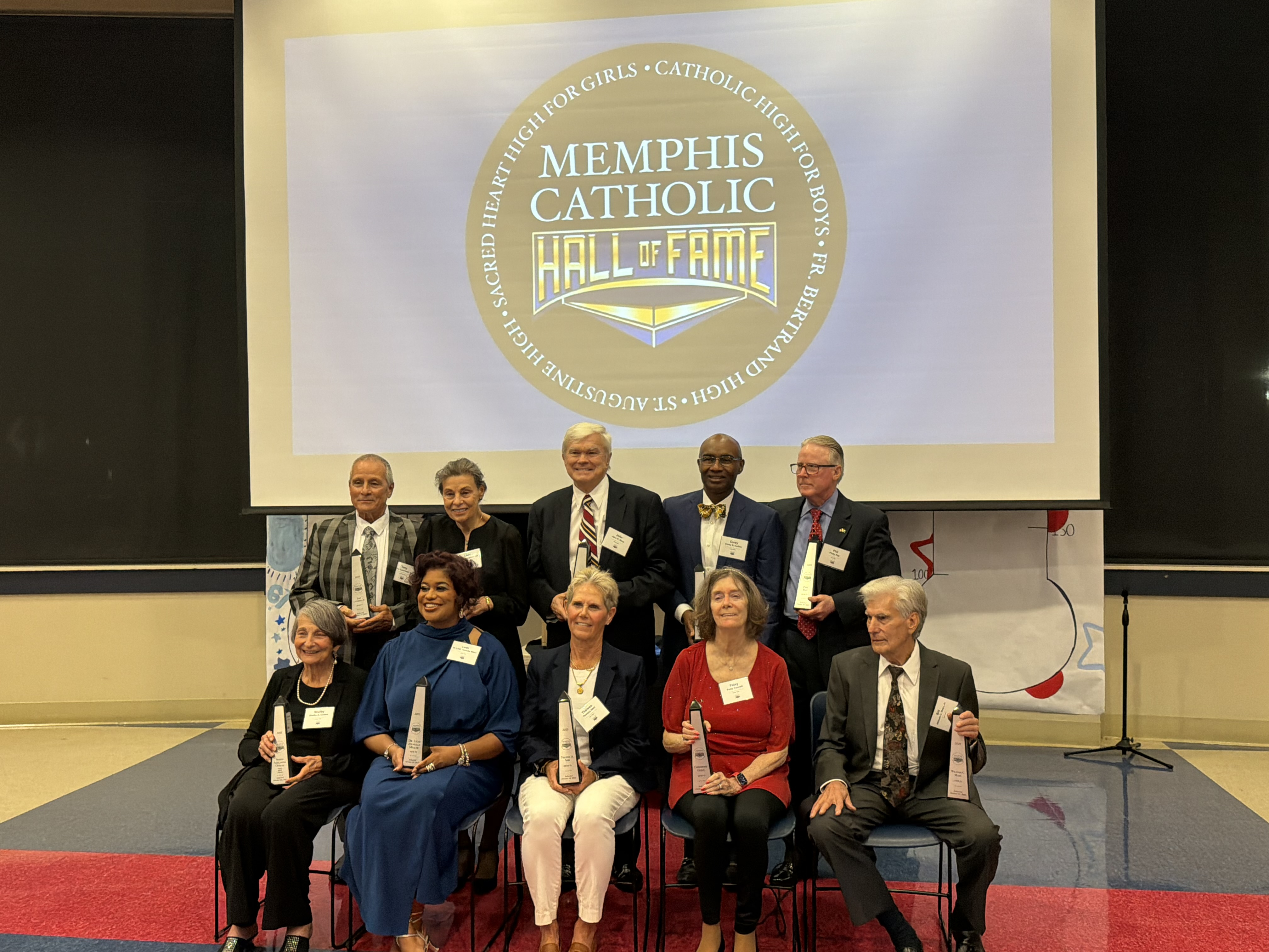 Theresa A. Simi with fellow inductees into the 2025 Memphis Catholic Hall of Fame