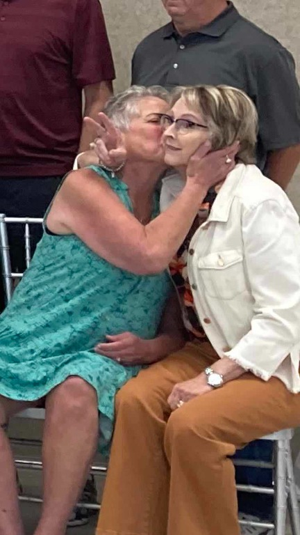 Kissing cousins Renee Swanhorst and Diane Gabler