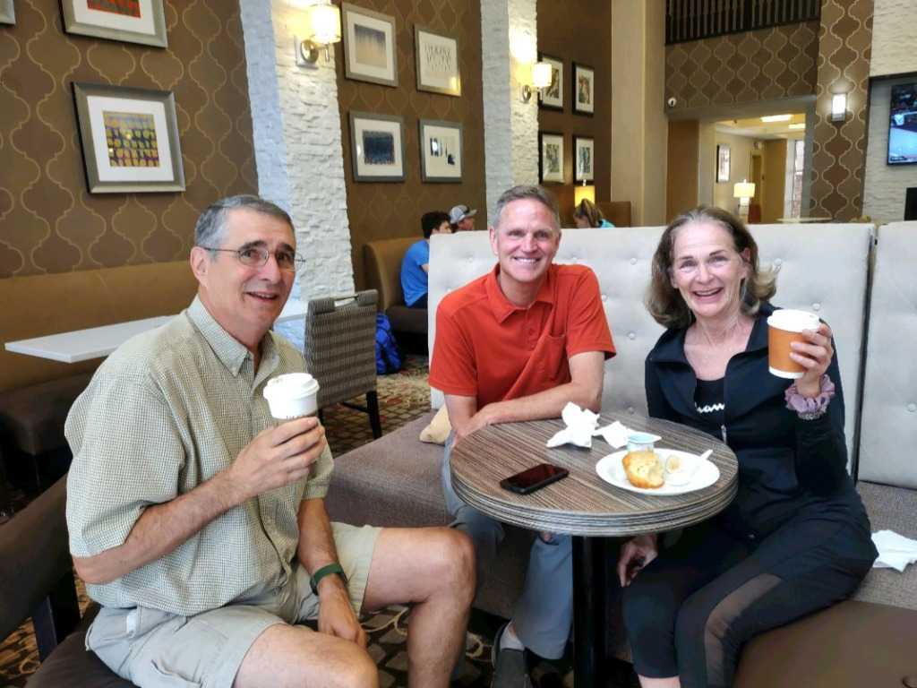 Conrad Melius, Joel Melius and Jane Ringolsby enjoying breakfast