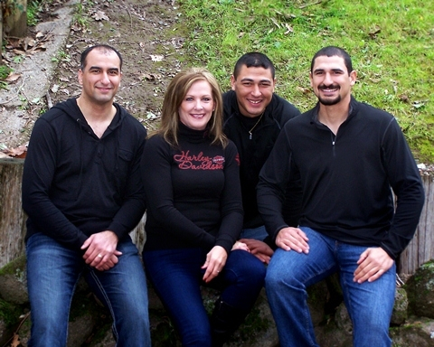 My three sons, Brandon(left)Jordon(right), and Trevor(center rear) with their momma:)