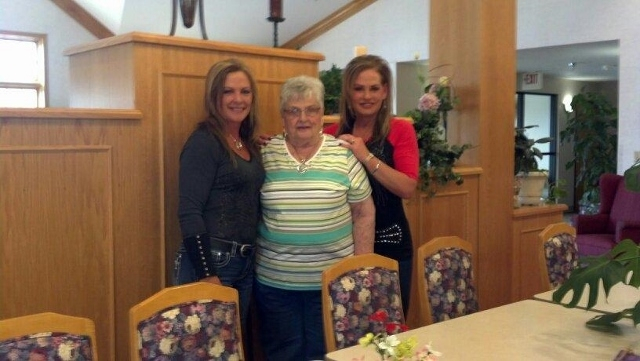 The twins visiting Mom at Davis Court in 2012