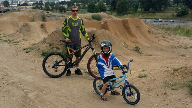 Biking together at a dirt track in Denver