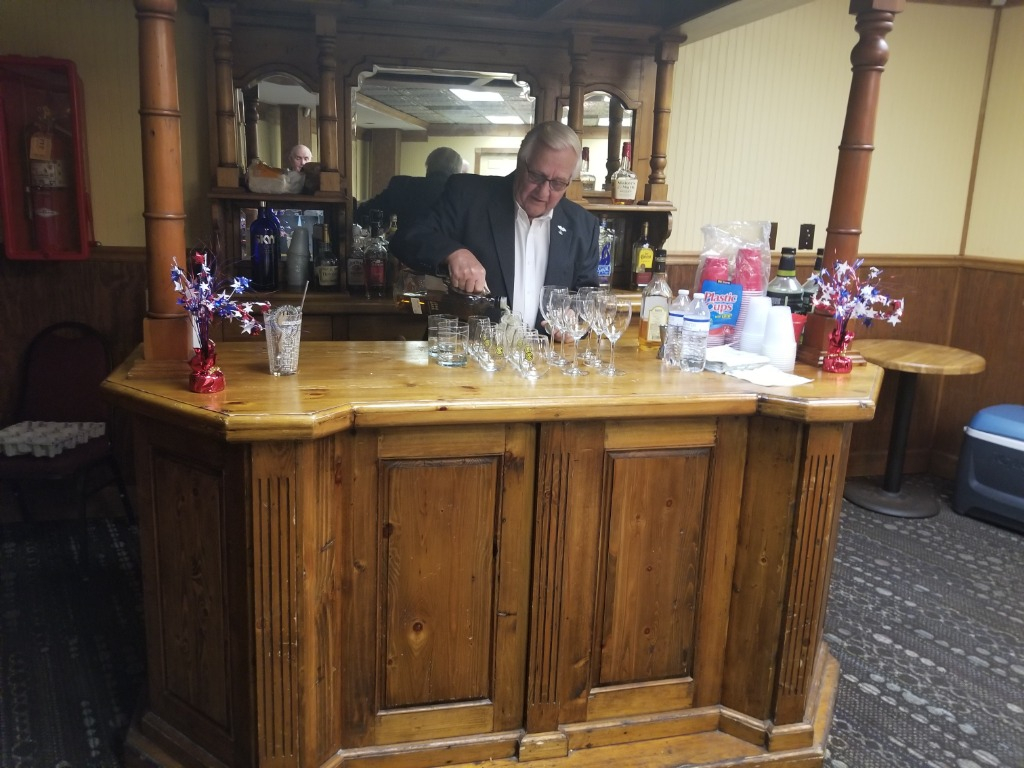 Bartender Donn Berney pours himself a big one!