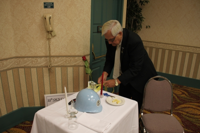 Donn Berney lighting the memorial candles