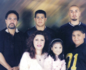 An older picture of me and my family taken in 1999.