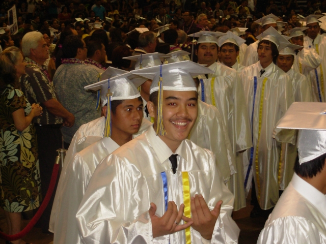 Isaac Makahanaloas high school graduation. Stepson of Thomas Sagapolu.
Kipeni>Rowena>Tom and Sharon>Isaac Makahanaloa.