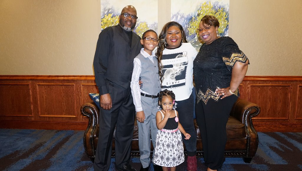 Michael and Towanna with daughter Tianna, grandson Jamichael, and grandniece Riley (below).