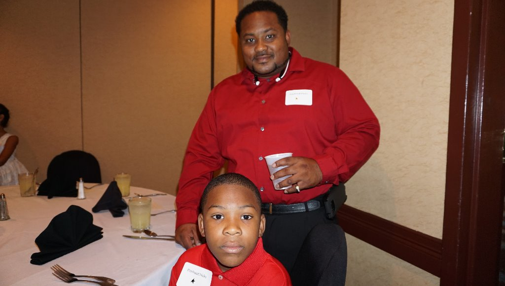 Roosevelt Hicks, Jr. (son of Cheryl Rainey Davis) with his son, Rashad Hicks.