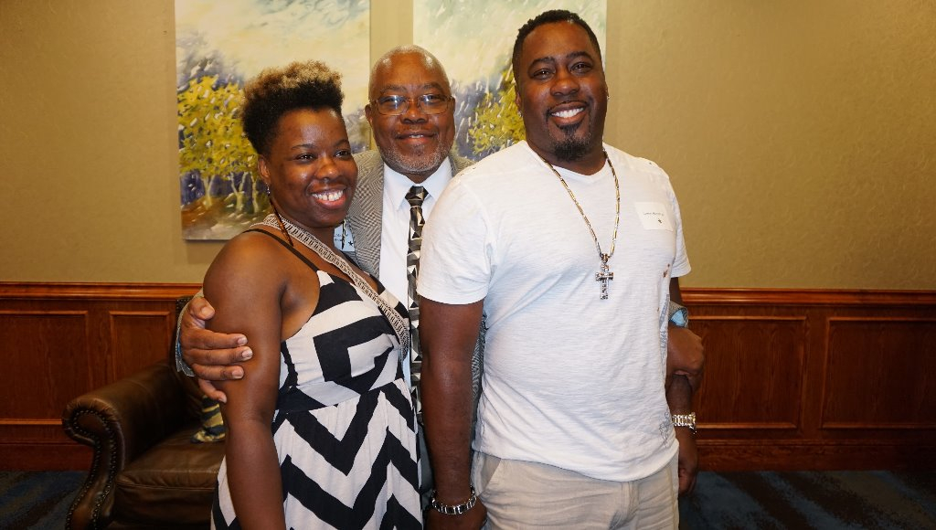 Mike with 2 of 3 children, Ayanna and Aaron JR Brown, Jr.