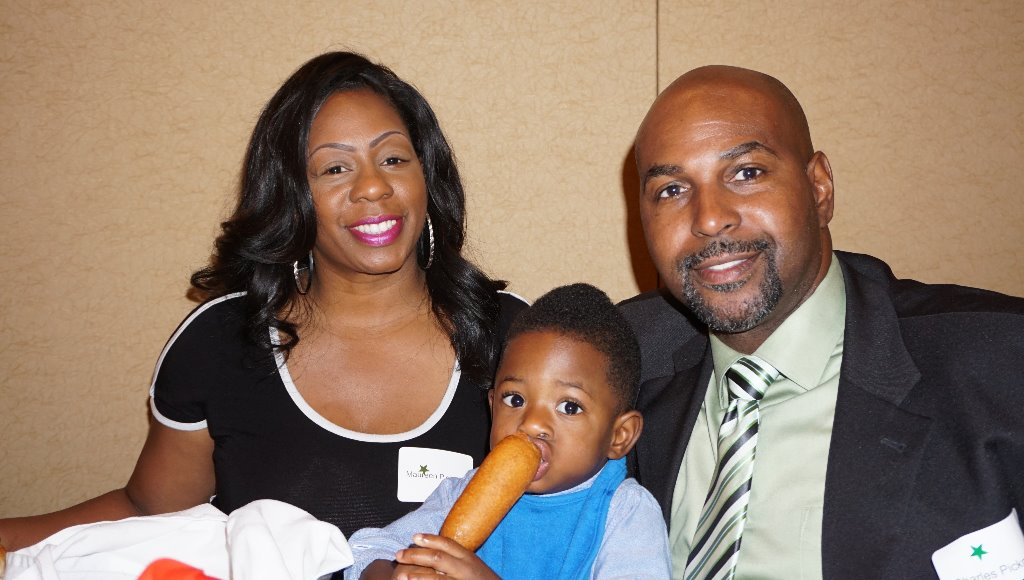 Charles with wife, Maureen, and son.
