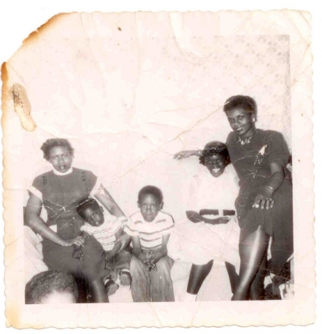 Rose, her sons, Tony and Alan (the top of Butchs head appears in the corner), Teena, and Girlie