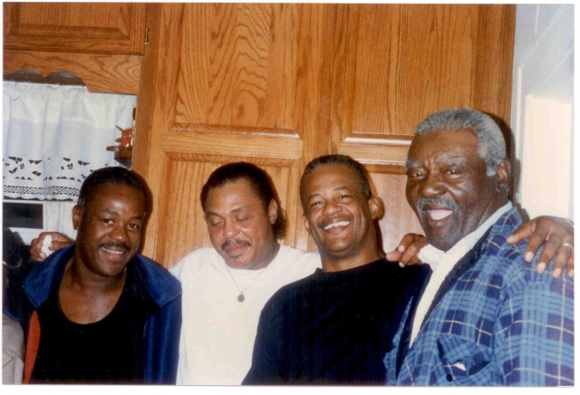 Sons of James Mickey Brown with Sam Brown. Left to right: Robert, Raymond, and Maurice.