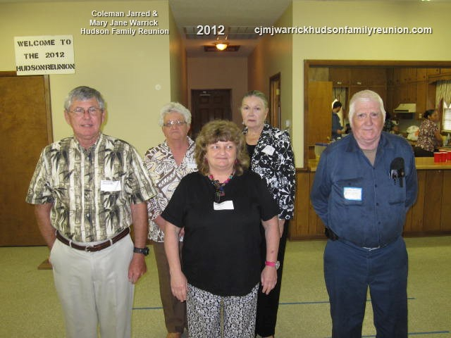 2012 – Memorial Candlelight Ceremony Representatives:
Front Row – Peggy Hudson Pollock, Family of George.
Second Row – Howard Mitchell Sizemore, Family of Charlie; Oliver Hudson Faulk Sr. Family of Hollie.
Third Row – Gwen Bishop, Family of Sam; Dixie Hud