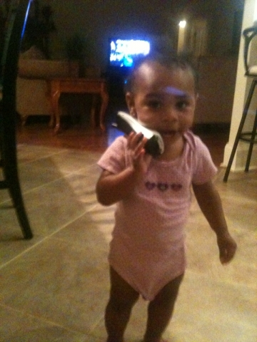 Amina talking to Grandma on the phone. 06/04/2010