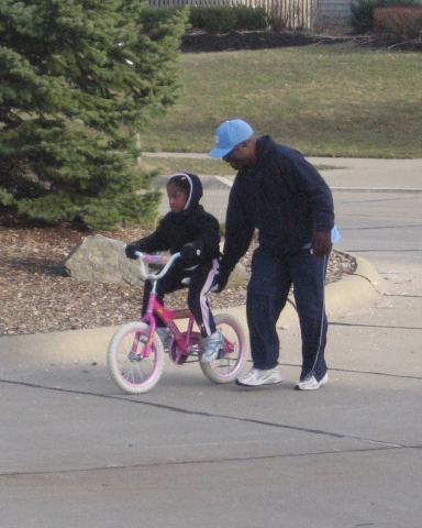Mya riding 2-wheeler