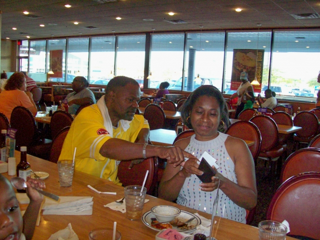 Faith and Tyrone at Old Country Buffet. Small family gathering the evening before Faith left to return to Washington D.C.