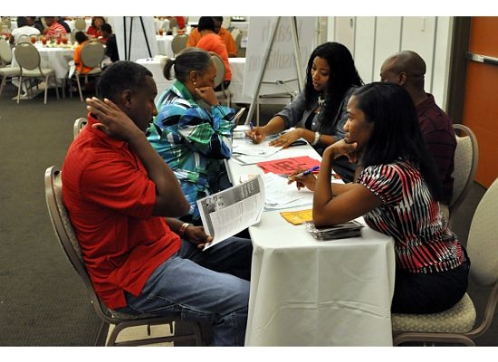 Carl Martin and Inez Marshall receiving Medical Consultation