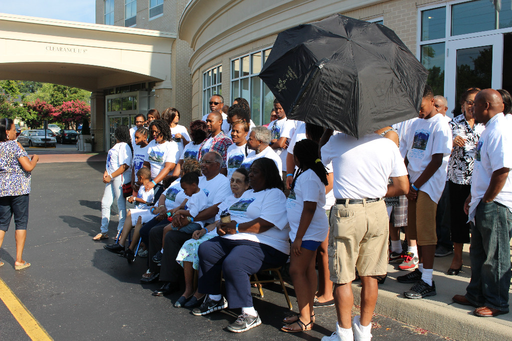 Preparing to take the group photo on Saturday morning