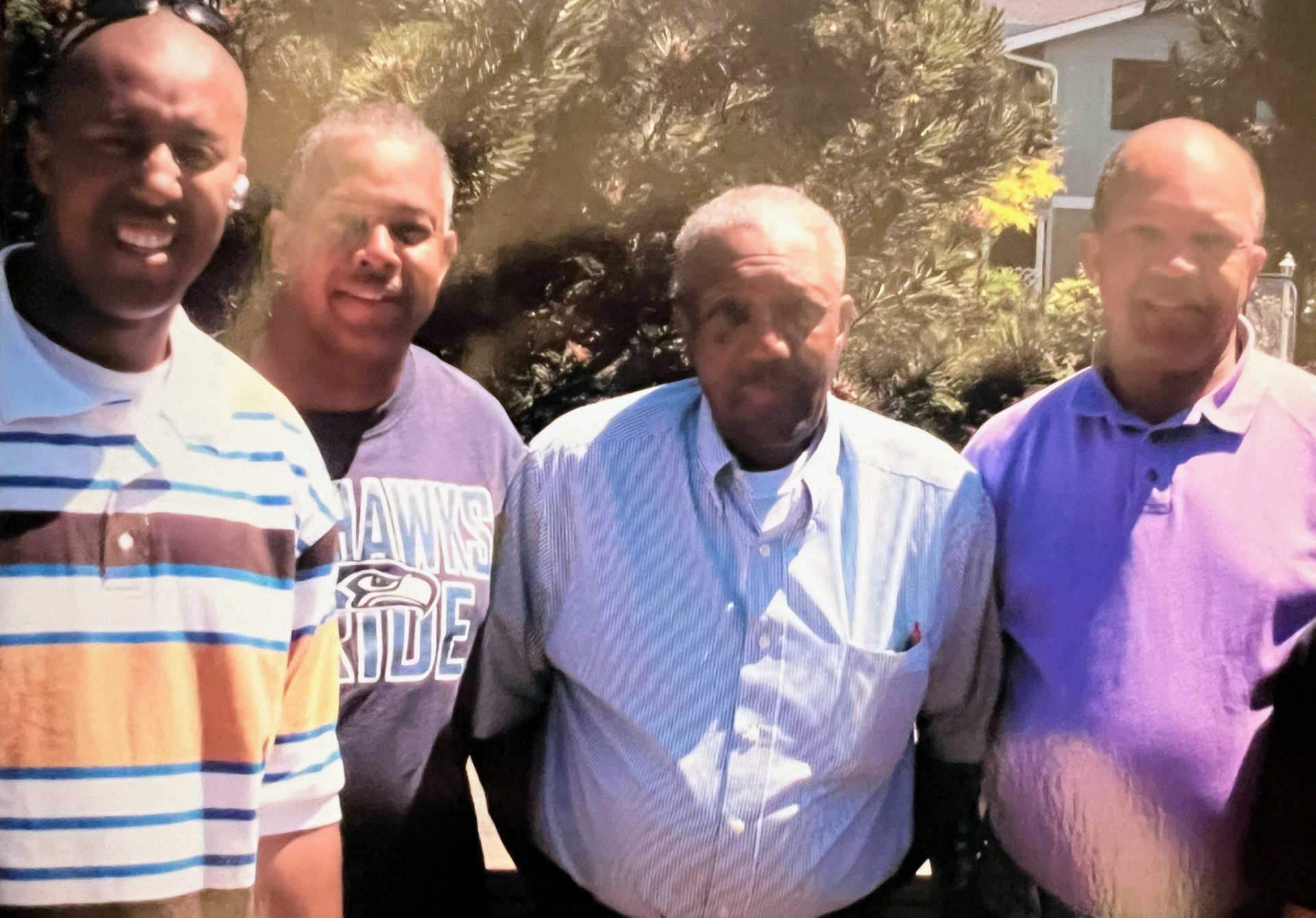 Oliver Tillman three generations with our father Oliver, me-Oliver, my brother Wendell and our sons, Matthew who is my son and Troy is Wendells.