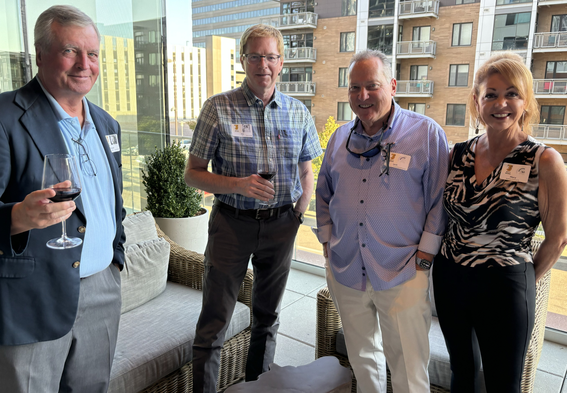 Michael Hume, Jay Fry, Jack McClurg, and Mary Sanfilippo McClurg '84