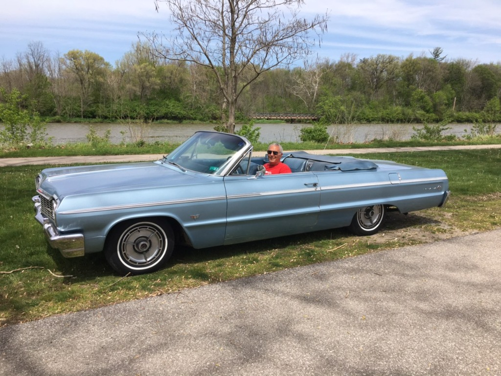 Paul Gagliano in his 64 Chevy Impala SS 327 convertible.