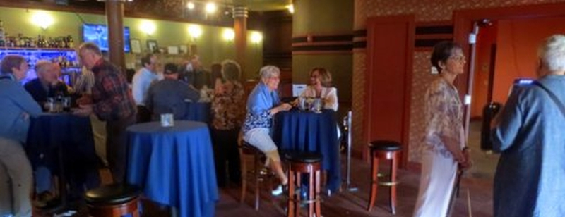 hanging out at the bar at the 50th reunion