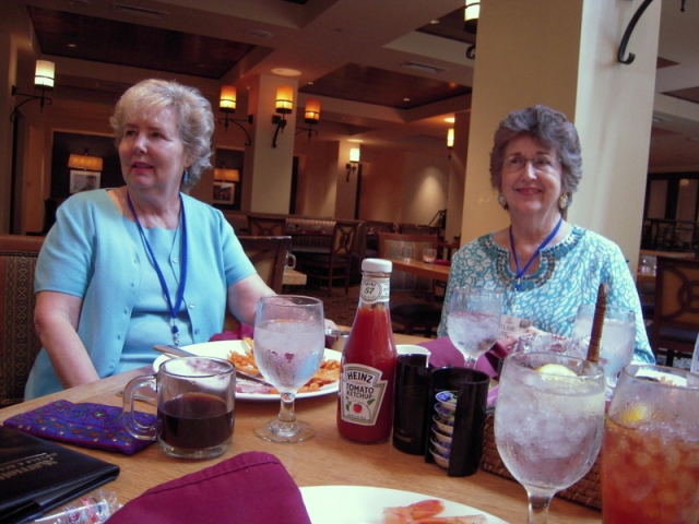 PAT ROTEN(CRAVEN), ELSIE HOSTETTER(STOVALL) ENJOYING THE FRUITS OF THEIR LABOR