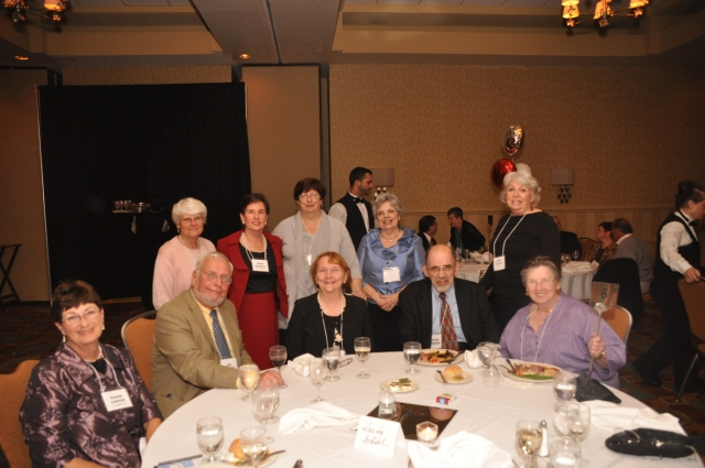 Standing: Marriane (McKiel) Ernst, Mary (Mac Neil) Desmond, Susan (Carver) Thompson, Carol (Duggan) Oldham, Carol (Crocker) Hayward, Mary (Murphy) Denehy. Seated: Sue Carver, Cal Cutter, Jo Mary & Arthur Ferreira, Maryann Ogonowski. 
