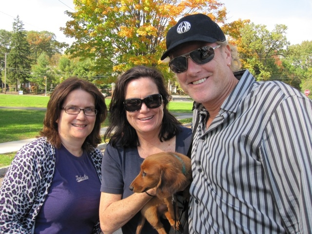 Sheila pops by Memorial Field to join Mimi and Bruce.