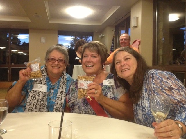 Peggy Cambra Todd, Mary Borrelli Thomas & Becky Bogardus Weislow enjoying delicious carmelcorn compliments of Skip Wellman