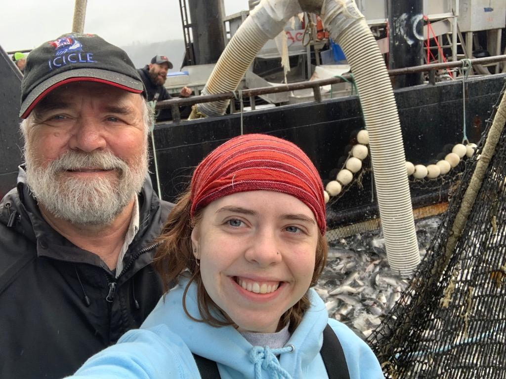 My daughter, seining with me